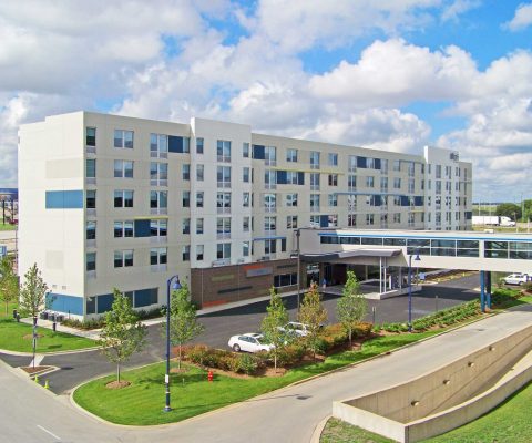 Enclosed pedestrian walkway at Aloft Hotel